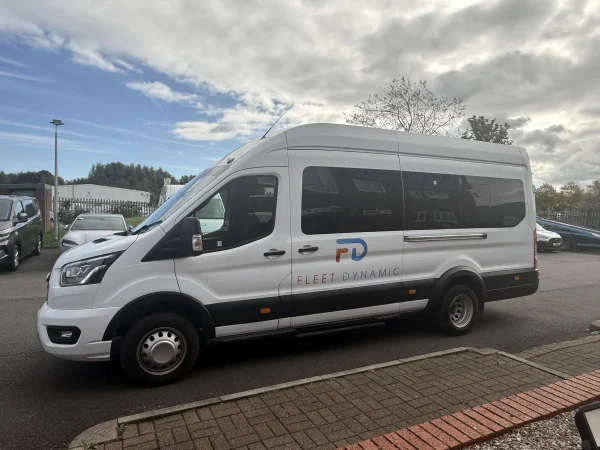 Side profile of the Fleet Dynamic Ford Transit 17-seater minibus